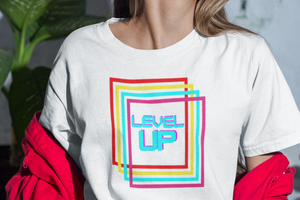 Retro designed gamer Level UP.  Pastel colors and 70's styling takes ya back to the early days of video gaming. Tee T-shirt