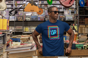 Retro designed gamer Level UP.  Pastel colors and 70's styling takes ya back to the early days of video gaming. Tee T-shirt